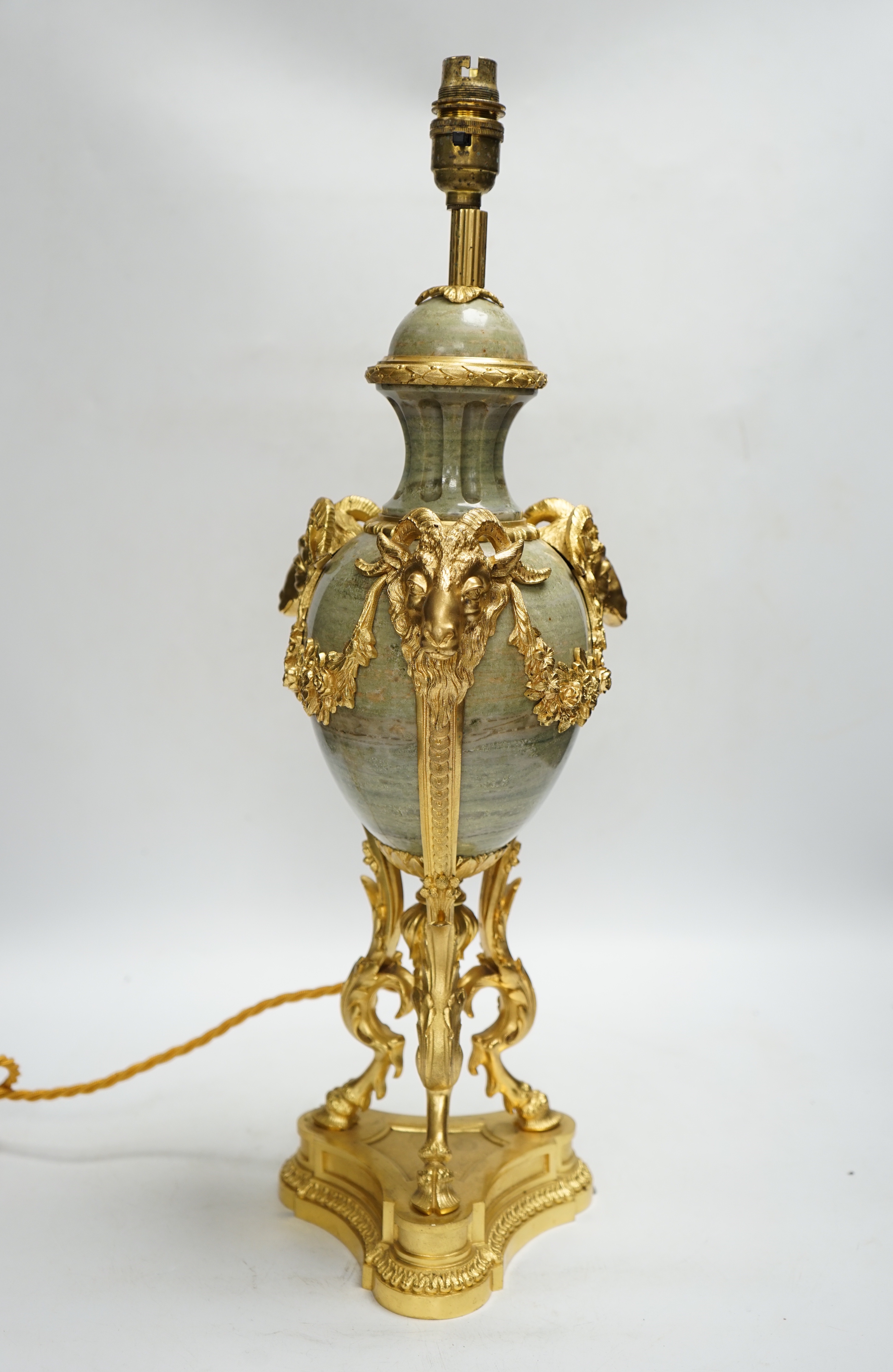 A Louis XVI style ormolu mounted ram’s head table lamp, 52cm.